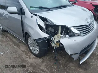 2012 Toyota Sienna XLE AAS with VIN 5TDYK3DC5CS260236, listed as a IAAI auction lot 41861457 with 123,530 mi miles and . Bid and sale history available at DreamBid. Image 6.