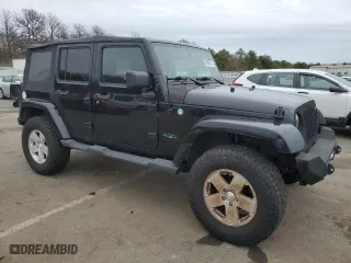 2011 Jeep Wrangler Unlimited Sahara with VIN 1J4HA5H14BL507148, listed as a Copart auction lot 52480325 with 233,835 mi miles and Clean Title. Bid and sale history available at carsss.com. Image 4.