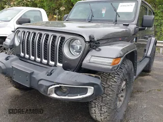 2021 Jeep Wrangler Unlimited Sahara with VIN 1C4JJXP60MW704738, listed as a IAAI auction lot 42042079 with 63,765 mi miles and . Bid and sale history available at DreamBid. Image 6.