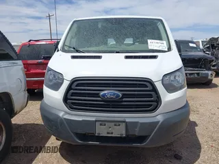 2018 Ford Transit Cargo with VIN 1FTYE1YG4JKA25467, listed as a IAAI auction lot 41738700 with 198,126 mi miles and . Bid and sale history available at DreamBid. Image 12.