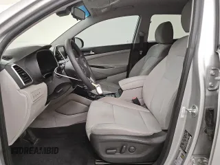 2021 Hyundai Tucson Value with VIN KM8J33A42MU392228, listed as a Copart auction lot 49471815 with 141,637 mi miles and Clean Title. Bid and sale history available at DreamBid. Image 7.