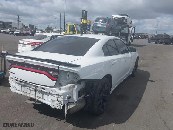 2018 Dodge Charger SXT with VIN 2C3CDXBG8JH297718, listed as a IAAI auction lot 41910526 with 63459 miles. Bid and sale history available at carsss.com. Image 4.
