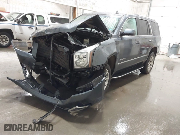 2019 GMC Yukon Denali with VIN 1GKS2CKJ9KR359070, listed as a IAAI auction lot 41682027 with 95,015 mi miles. Bid and sale history available at carsss.com. Image 2.