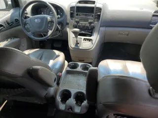 2009 Kia Sedona LX with VIN KNDMB233096296810, listed as a Copart auction lot 64614694 with 231,572 mi miles and Salvage Title. Bid and sale history available at carsss.com. Image 8.