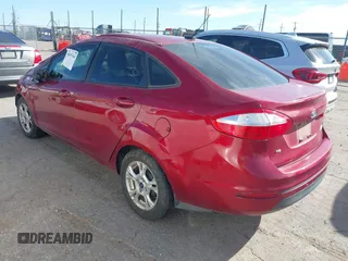 2016 Ford Fiesta SE with VIN 3FADP4BJ1GM104505, listed as a IAAI auction lot 38973344 with 90,996 mi miles. Bid and sale history available at carsss.com. Image 3.