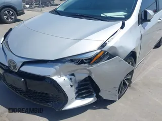 2019 Toyota Corolla L with VIN 5YFBURHE5KP877691, listed as a IAAI auction lot 42108591 with 85,813 mi miles and . Bid and sale history available at DreamBid. Image 6.