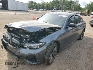 2022 BMW 3 Series M340i xDrive with VIN WBA5U9C02NFL65825, listed as a Copart auction lot 60244064 with 22,548 mi miles and Salvage Title. Bid and sale history available at DreamBid. Image 1.