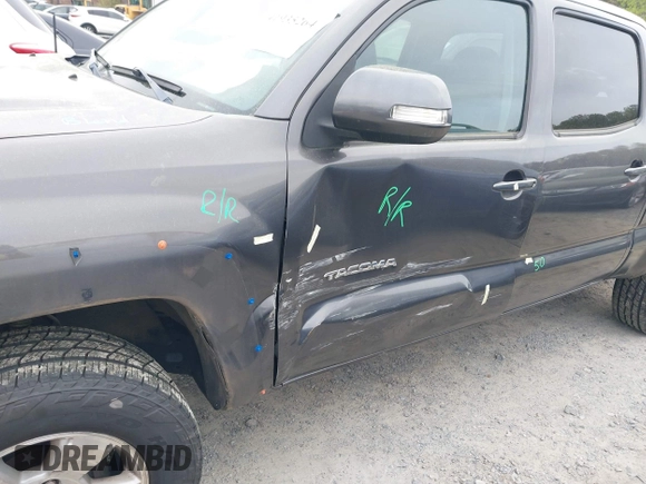 2015 Toyota Tacoma with VIN 3TMMU4FNXFM073978, listed as a IAAI auction lot 41935264 with 132,806 mi miles and . Bid and sale history available at DreamBid. Image 6.