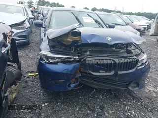 2019 BMW 3 Series 330i xDrive with VIN WBA5R7C59KAJ83727, listed as a IAAI auction lot 42244312 with 69,680 mi miles and . Bid and sale history available at DreamBid. Image 6.