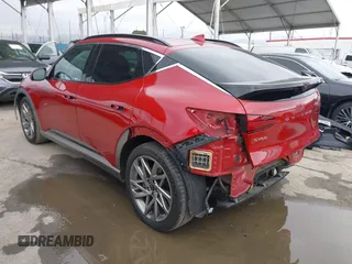 2023 Genesis GV60 Advanced z VIN KMUKCDTC9PU017098, wystawiony jako IAAI lot #41787572 z przebiegiem 1 685 mil mil oraz . Historia ofert i sprzedaży dostępna na DreamBid. Obrazek 3.