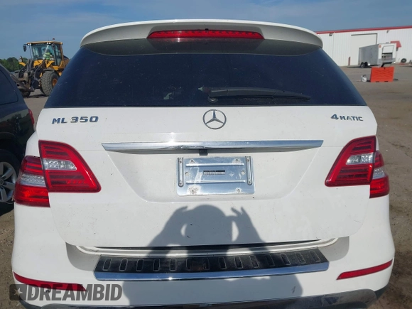 2014 Mercedes-Benz M 350 with VIN 4JGDA5HB9EA424811, listed as a IAAI auction lot 42079690 with 127,914 mi miles and . Bid and sale history available at DreamBid. Image 16.