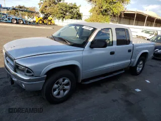 2004 Dodge Dakota Sport with VIN 1D7HL38N44S573883, listed as a Copart auction lot 74955984 with 165,510 mi miles and Salvage Title. Bid and sale history available at carsss.com. Image 1.
