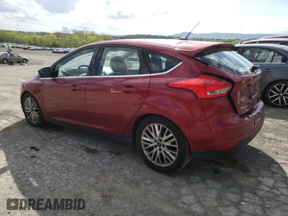 2015 Ford Focus Titanium с VIN 1FADP3N29FL215818, выставлен на аукционе Copart как лот 55442525 с пробегом 128 887 миль миль и Списание • Salvage title. История ставок и продаж доступна на DreamBid. Изображение 2.