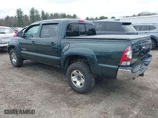2009 Toyota Tacoma with VIN 3TMLU42N09M031972, listed as a IAAI auction lot 42001100 with 163,567 mi miles. Bid and sale history available at carsss.com. Image 3.