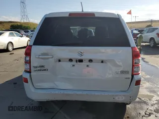 2012 Suzuki Grand Vitara Premium z VIN JS3TD0D64C4100245, wystawiony jako Copart lot #71365134 z przebiegiem 100 501 mil mil oraz Szkoda całkowita • Salvage title. Historia ofert i sprzedaży dostępna na DreamBid. Obrazek 6.