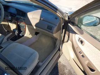 2000 Nissan Altima XE with VIN 1N4DL01D8YC235627, listed as a IAAI auction lot 41662564 with 79,409 mi miles. Bid and sale history available at carsss.com. Image 5.