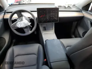 2024 Tesla Model Y Long Range с VIN 7SAYGDEE4RA325145, выставлен на аукционе Copart как лот 61132955 с пробегом 16 659 миль миль и Списание • Salvage title. История ставок и продаж доступна на DreamBid. Изображение 8.