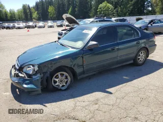 1997 Honda Civic LX z VIN JHMEJ6673VS031666, wystawiony jako Copart lot #55828525 z przebiegiem 208 886 mil mil oraz Szkoda całkowita • Salvage title. Historia ofert i sprzedaży dostępna na DreamBid. Obrazek 1.