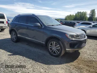 2015 Volkswagen Touareg Lux z VIN WVGEP9BP0FD006992, wystawiony jako Copart lot #59524445 z przebiegiem 169 822 mil mil oraz Szkoda całkowita • Salvage title. Historia ofert i sprzedaży dostępna na DreamBid. Obrazek 4.