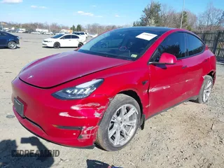 2023 Tesla Model Y Long Range with VIN 7SAYGDEE8PA121218, listed as a IAAI auction lot 41888923 with 34,796 mi miles. Bid and sale history available at carsss.com. Image 21.