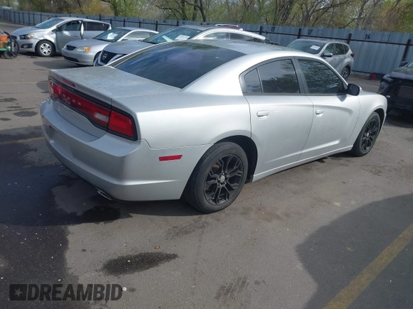 2012 Dodge Charger SE with VIN 2C3CDXBG5CH101849, listed as a IAAI auction lot 42053824 with 194,274 mi miles and . Bid and sale history available at DreamBid. Image 4.