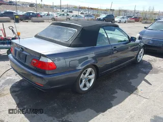 2005 BMW 3 Series 325Ci with VIN WBABW33405PL35861, listed as a IAAI auction lot 42042997 with 137,148 mi miles and . Bid and sale history available at carsss.com. Image 4.
