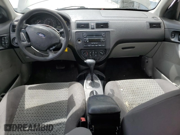 2006 Ford Focus SE with VIN 1FAHP36N56W223049, listed as a Copart auction lot 61211745 with 185,609 mi miles and Salvage title. Bid and sale history available at DreamBid. Image 8.