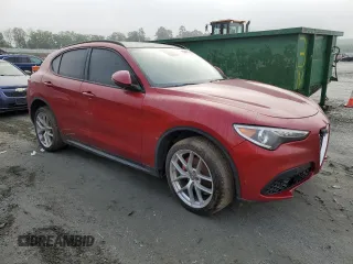 2019 Alfa Romeo Stelvio Ti z VIN ZASPAKBN2K7C35002, wystawiony jako Copart lot #55448965 z przebiegiem 109 812 mil mil oraz Tytuł czysty. Historia ofert i sprzedaży dostępna na DreamBid. Obrazek 4.