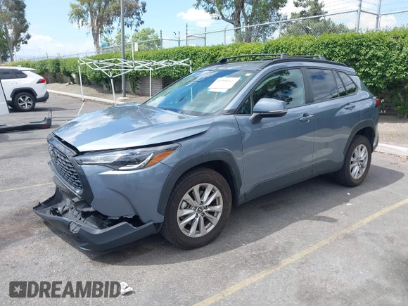 2022 Toyota Corolla Cross LE with VIN 7MUBAAAG1NV004852, listed as a IAAI auction lot 42251301 with 50,197 mi miles and . Bid and sale history available at DreamBid. Image 2.