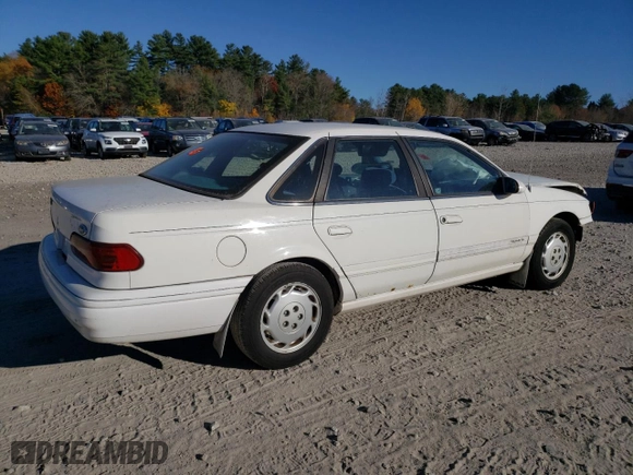 1995 Ford Taurus GL with VIN 1FALP52U6SG103526, listed as a Copart auction lot 77614004 with 58,551 mi miles and Clean Title. Bid and sale history available at carsss.com. Image 3.