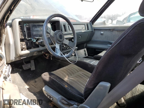 1987 Buick Regal with VIN 1G4GJ1171HP440059, listed as a Copart auction lot 49624945 with 21,443 mi miles and Salvage Title. Bid and sale history available at DreamBid. Image 7.