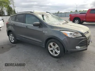 2015 Ford Escape SE with VIN 1FMCU9GXXFUC72335, listed as a Copart auction lot 51114735 with 157,471 mi miles and Salvage Title. Bid and sale history available at DreamBid. Image 4.