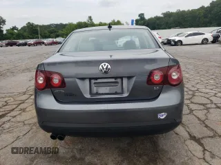 2008 Volkswagen Jetta SE with VIN 3VWRM71K08M037186, listed as a Copart auction lot 60173795 with 186,594 mi miles and Salvage title. Bid and sale history available at DreamBid. Image 6.