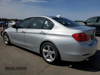 2013 BMW 3 Series 328i xDrive with VIN WBA3B5G54DNS03260, listed as a Copart auction lot 51511735 with 83,922 mi miles and Salvage title. Bid and sale history available at DreamBid. Image 2.