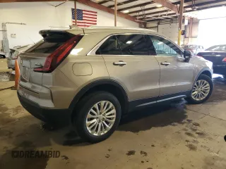 2024 Cadillac XT4 AWD Luxury with VIN 1GYFZBR48RF242850, listed as a Copart auction lot 52290865 with 1,524 mi miles and Salvage Title. Bid and sale history available at carsss.com. Image 3.