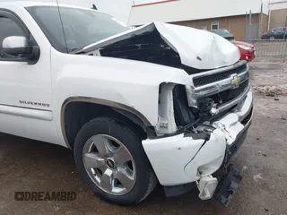 2011 Chevrolet Silverado 1500 LT with VIN 1GCRKSE32BZ176823, listed as a IAAI auction lot 41957809 with 136,759 mi miles and . Bid and sale history available at DreamBid. Image 6.