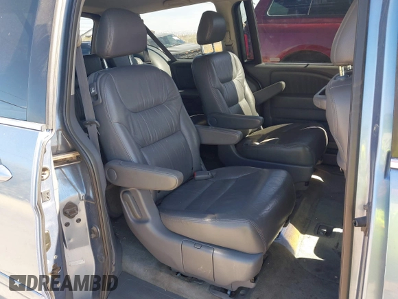 2006 Honda Odyssey EX-L with VIN 5FNRL38796B099851, listed as a IAAI auction lot 41555109 with 154,707 mi miles and . Bid and sale history available at DreamBid. Image 8.