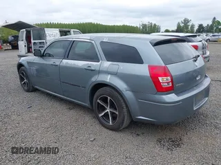 2006 Dodge Magnum with VIN 2D4FV47T66H302211, listed as a IAAI auction lot 42090473 with 218,250 mi miles and . Bid and sale history available at carsss.com. Image 3.