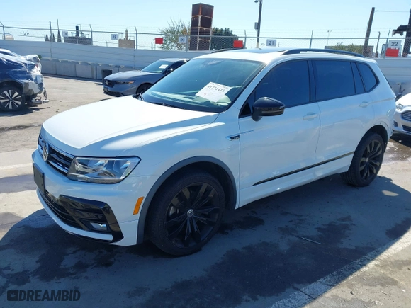 2020 Volkswagen Tiguan SE with VIN 3VV3B7AX8LM063202, listed as a IAAI auction lot 41731419 with 41,241 mi miles. Bid and sale history available at carsss.com. Image 2.