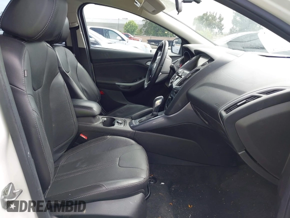 2014 Ford Focus Titanium with VIN 1FADP3N24EL186050, listed as a IAAI auction lot 42481684 with 187,687 mi miles and . Bid and sale history available at DreamBid. Image 5.