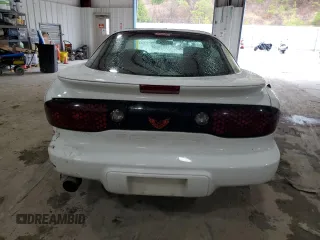 1998 Pontiac Firebird Firebird z VIN 2G2FS22KXW2207621, wystawiony jako Copart lot #82717434 z przebiegiem 63 973 mil mil oraz Szkoda całkowita • Salvage title. Historia ofert i sprzedaży dostępna na DreamBid. Obrazek 6.
