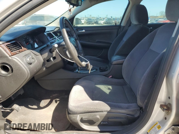 2014 Chevrolet Impala LT with VIN 2G1WB5E39E1147619, listed as a Copart auction lot 46898055 with 146,009 mi miles and Salvage Title. Bid and sale history available at DreamBid. Image 7.