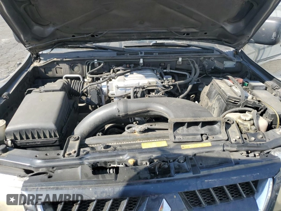 2006 Mitsubishi Montero Limited z VIN JA4MW51SX6J003675, wystawiony jako Copart lot #74719484 z przebiegiem 192 367 mil mil oraz Szkoda całkowita • Salvage title. Historia ofert i sprzedaży dostępna na DreamBid. Obrazek 14.