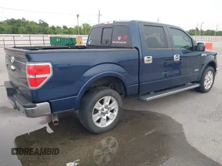 2013 Ford F-150 XL with VIN 1FTFW1ETXDKF51063, listed as a IAAI auction lot 42790441 with 303,665 mi miles and . Bid and sale history available at DreamBid. Image 4.