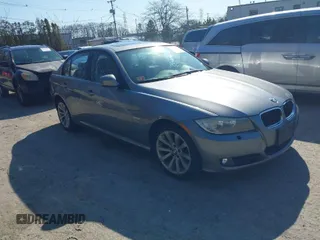 2011 BMW 3 Series 328i xDrive with VIN WBAPK7C57BA819476, listed as a IAAI auction lot 41998058 with 150,412 mi miles. Bid and sale history available at carsss.com. Image 1.