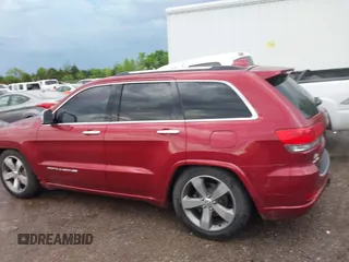 2014 Jeep Grand Cherokee Overland with VIN 1C4RJFCG9EC460165, listed as a IAAI auction lot 42092137 with 131,802 mi miles and . Bid and sale history available at DreamBid. Image 15.