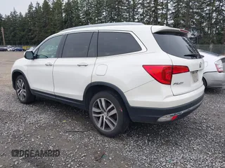 2017 Honda Pilot Elite with VIN 5FNYF6H06HB096156, listed as a IAAI auction lot 41771161 with 73,889 mi miles and . Bid and sale history available at DreamBid. Image 3.