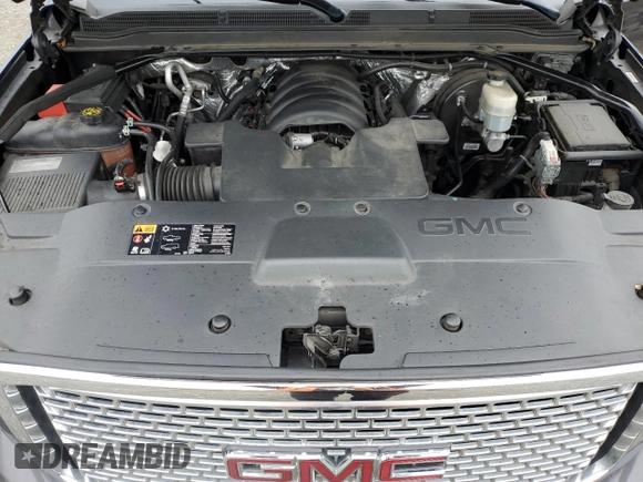 2015 GMC Yukon Denali with VIN 1GKS2CKJ7FR565008, listed as a Copart auction lot 48765355 with 191,606 mi miles and Clean Title. Bid and sale history available at carsss.com. Image 12.