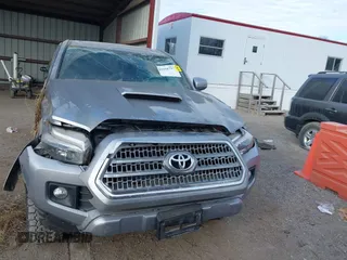 2017 Toyota Tacoma SR5 with VIN 3TMDZ5BN3HM025433, listed as a IAAI auction lot 41058797 with 68,355 mi miles and . Bid and sale history available at DreamBid. Image 13.