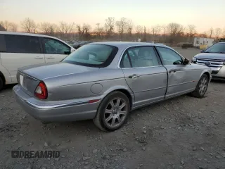 2005 Jaguar XJ with VIN SAJWA79C55SG37981, listed as a Copart auction lot 81142484 with 128,601 mi miles and Salvage Title. Bid and sale history available at carsss.com. Image 3.